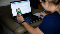 Nurse using phone.